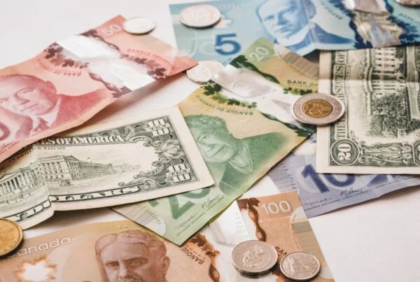 a pile of money sitting on top of a table