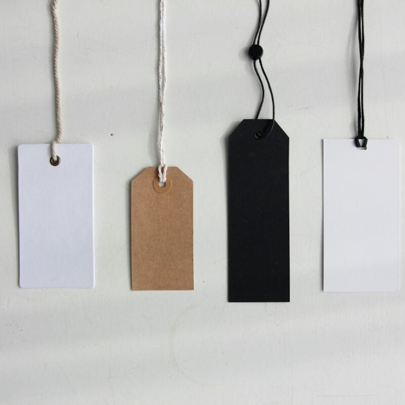 four paper card tags