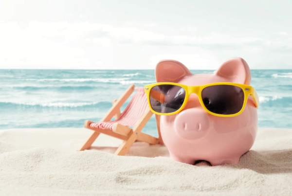 Piggy bank resting on vacation. Saving money, travel concept