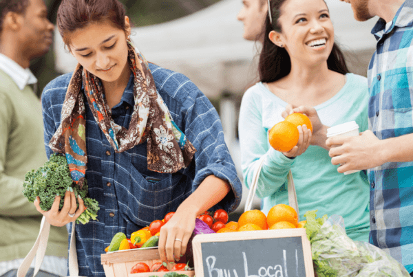 Couple shopping a local farmers market.