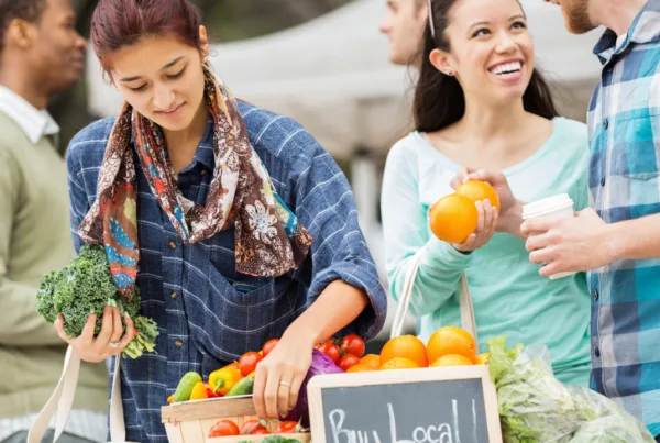 Couple shopping a local farmers market.