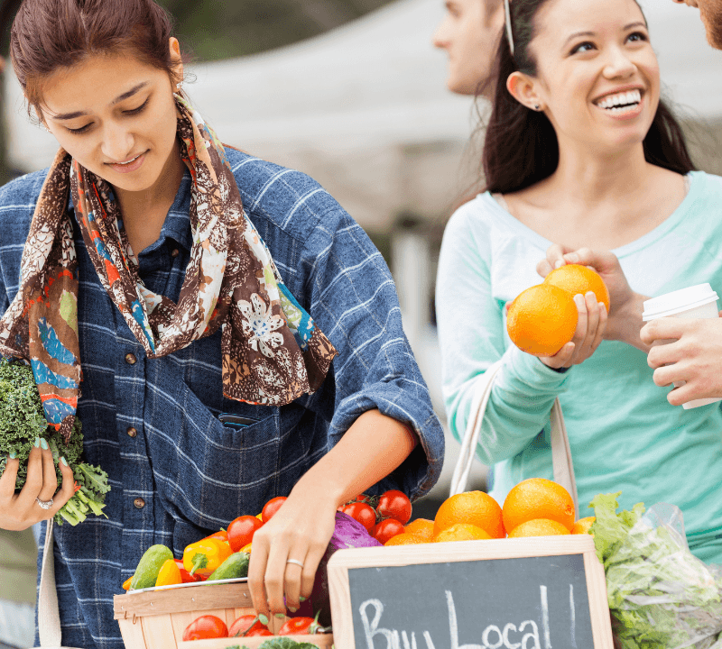 Couple shopping a local farmers market.