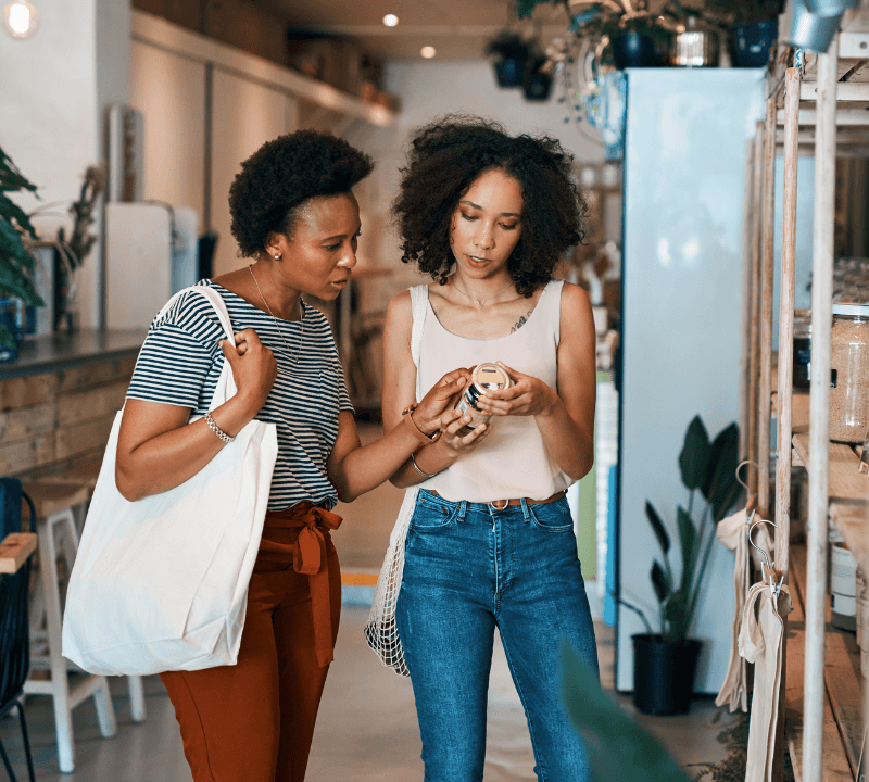 Shot of two young women shopping is a waste free store.