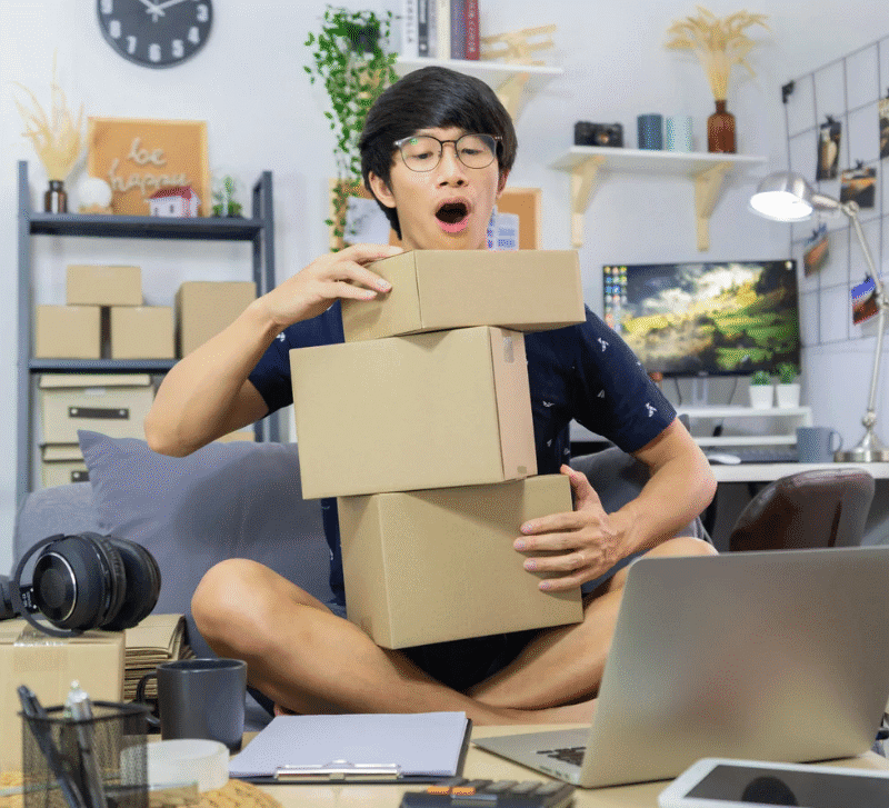 Startup small business Asian man young entrepreneur preparing parcels for delivery.