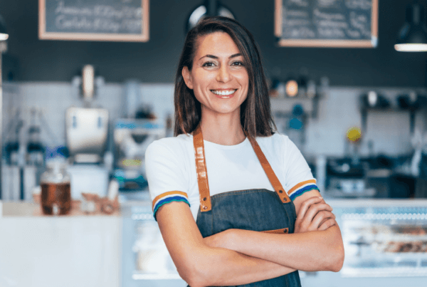 portrait of a confident and happy female owner at a cafe.